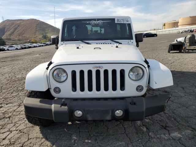 Photo 5 from auction – 2014 JEEP WRANGLER U with VIN 1C4HJWFG0EL118692