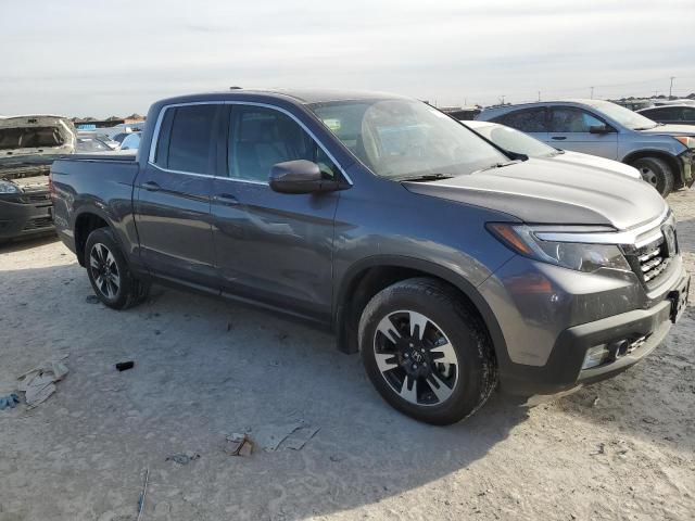 Photo 4 from auction – 2020 HONDA RIDGELINE with VIN 5FPYK3F50LB030288