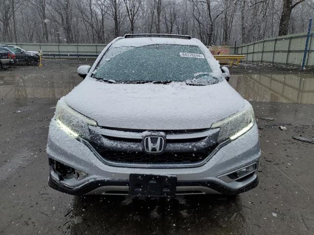 Photo 5 from auction – 2015 HONDA CR-V EXL with VIN 2HKRM4H71FH704515