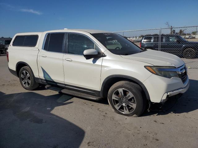 Photo 4 from auction – 2017 HONDA RIDGELINE with VIN 5FPYK2F60HB007748