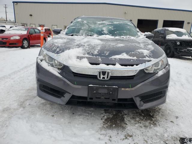 Photo 5 from auction – 2016 HONDA CIVIC LX with VIN 19XFC2F50GE049295