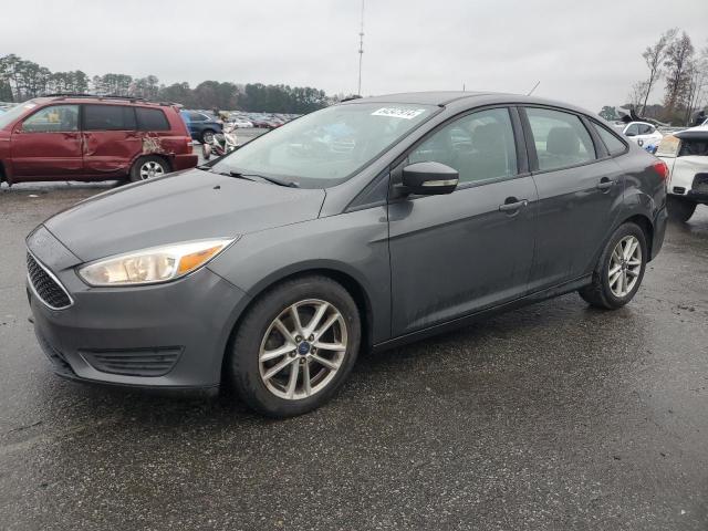FORD FOCUS SE 2017 with VIN 1FADP3F24HL279380 - Photo from auction