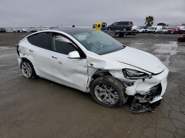 Photo 4 from auction – 2021 TESLA MODEL Y with VIN 5YJYGDED5MF133930