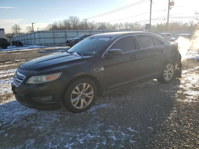 FORD TAURUS SEL 2010 with VIN 1FAHP2EW0AG128020 - Photo from auction