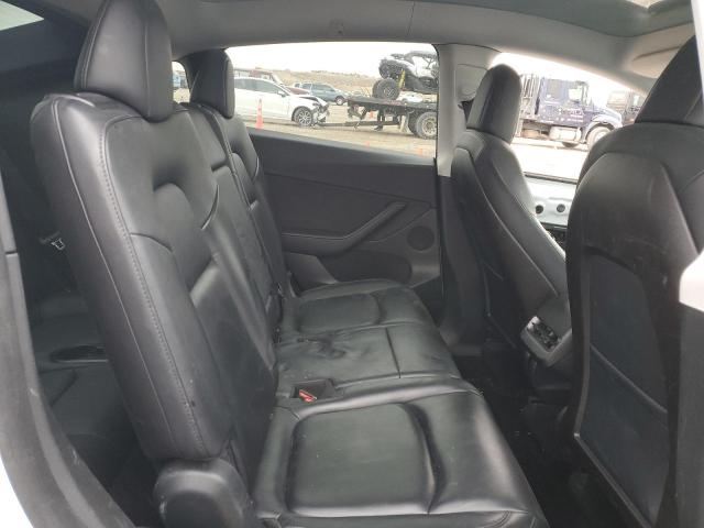 Photo 11 from auction – 2021 TESLA MODEL Y with VIN 5YJYGAEE2MF208350