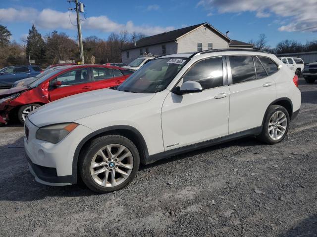 BMW X1 XDRIVE2 2015 with VIN WBAVL1C5XFVY29659 - Photo from auction