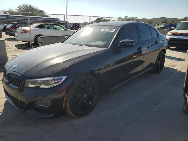 BMW 330I 2021 with VIN 3MW5R1J06M8C09977 - Photo from auction