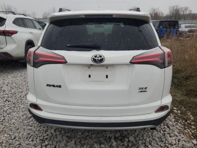 Photo 6 from auction – 2016 TOYOTA RAV4 XLE with VIN JTMRFREV0GJ095288