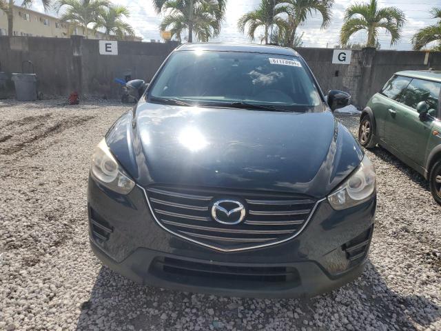 Photo 5 from auction – 2016 MAZDA CX-5 SPORT with VIN JM3KE2BY1G0714634