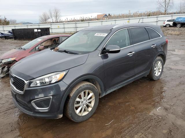 KIA SORENTO LX 2016 with VIN 5XYPG4A32GG122230 - Photo from auction