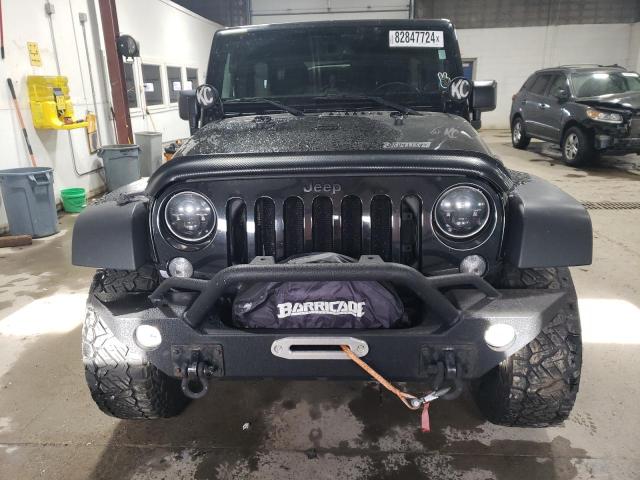 Photo 5 from auction – 2016 JEEP WRANGLER U with VIN 1C4BJWDG8GL105023
