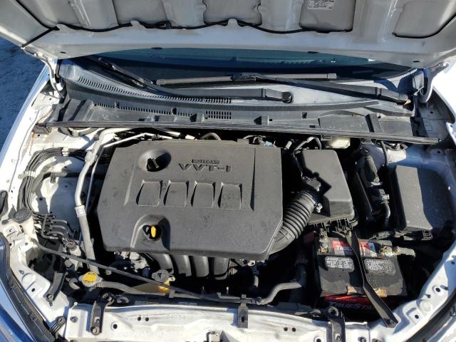 Photo 11 from auction – 2014 TOYOTA COROLLA L with VIN 5YFBURHEXEP009612