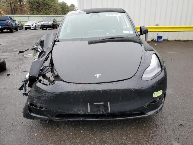 Photo 5 from auction – 2023 TESLA MODEL Y with VIN 7SAYGDEE3PA187661