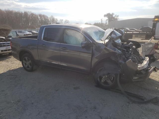 Photo 4 from auction – 2023 HONDA RIDGELINE with VIN 5FPYK3F59PB023510