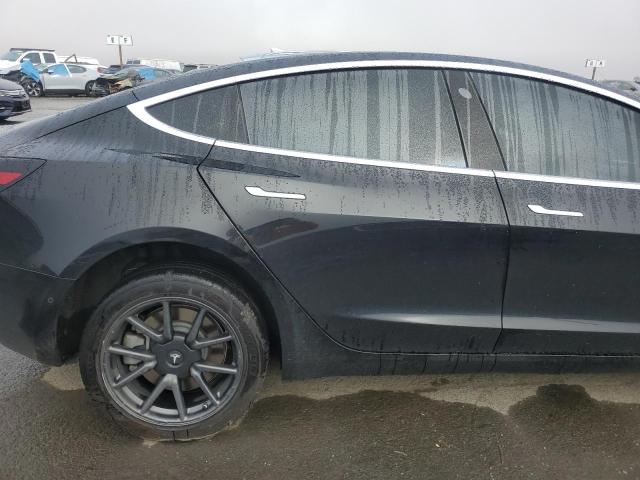Photo 10 from auction – 2019 TESLA MODEL 3 with VIN 5YJ3E1EA4KF399098