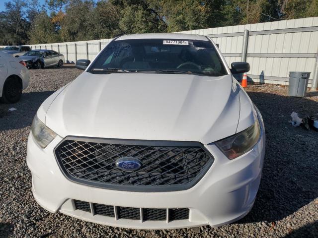 Photo 5 from auction – 2015 FORD TAURUS POL with VIN 1FAHP2MK1FG135726