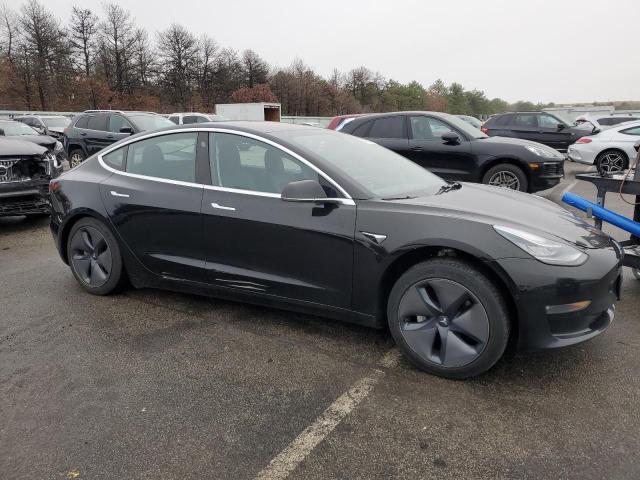 Photo 4 from auction – 2018 TESLA MODEL 3 with VIN 5YJ3E1EA7JF062634