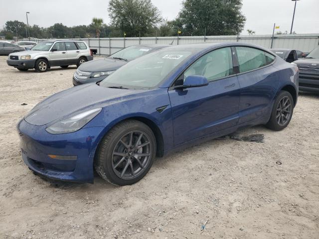 TESLA MODEL 3 2023 with VIN 5YJ3E1EA2PF657304 - Photo from auction