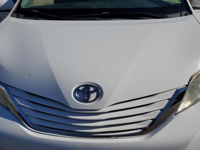 Photo 7 from auction – 2015 TOYOTA SIENNA LE with VIN 5TDKK3DCXFS577200