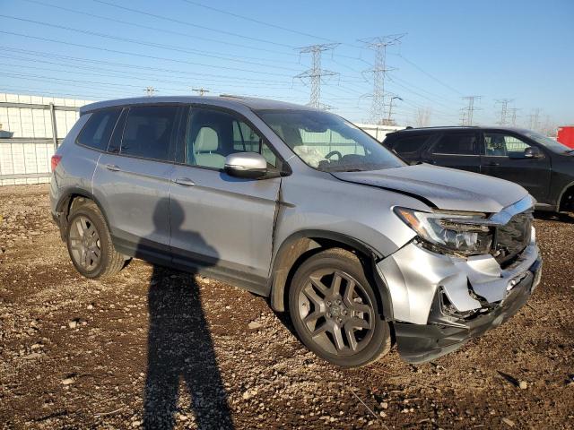 Photo 4 from auction – 2022 HONDA PASSPORT E with VIN 5FNYF8H5XNB008633