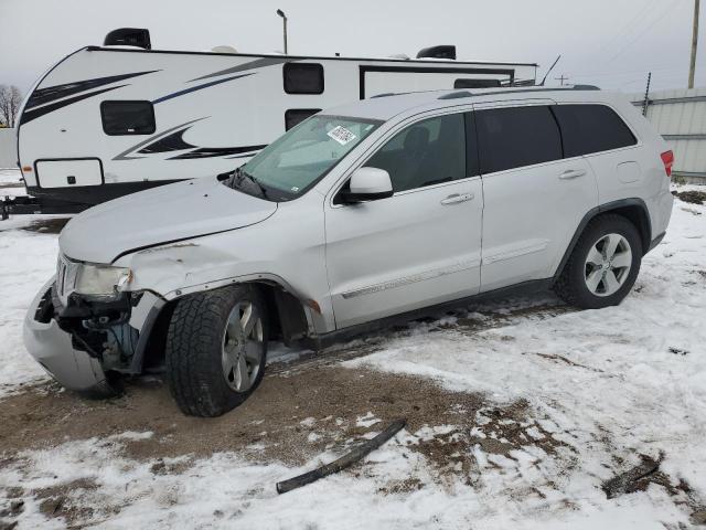 JEEP GRAND CHER 2011 with VIN 1J4RR4GG6BC670994 - Photo from auction