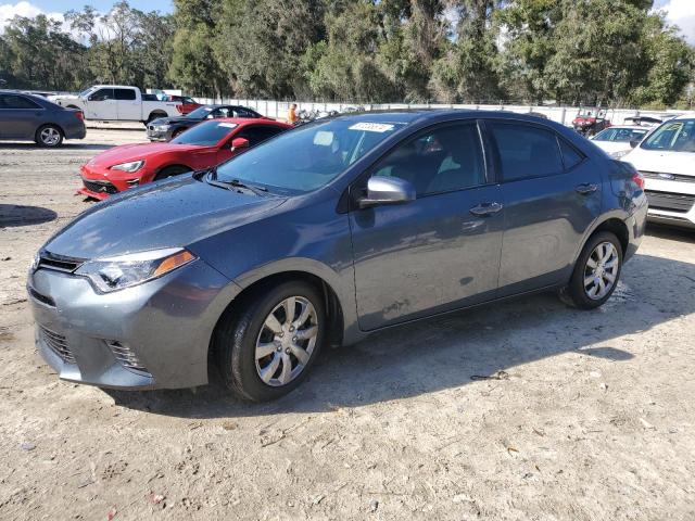 TOYOTA COROLLA L 2015 with VIN 2T1BURHE0FC310326 - Photo from auction