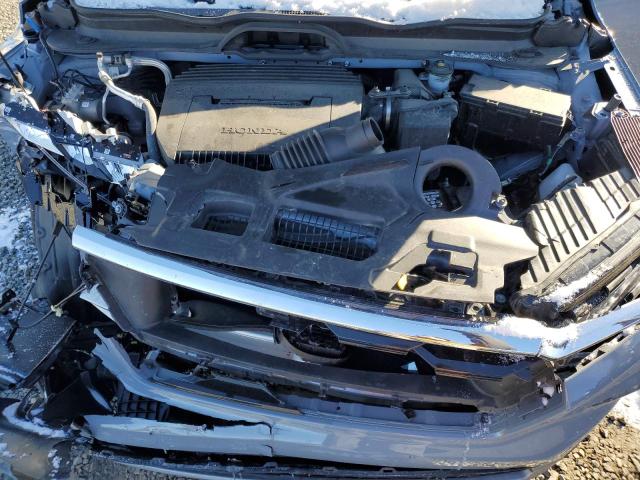 Photo 12 from auction – 2023 HONDA PILOT ELIT with VIN 5FNYG1H89PB033752