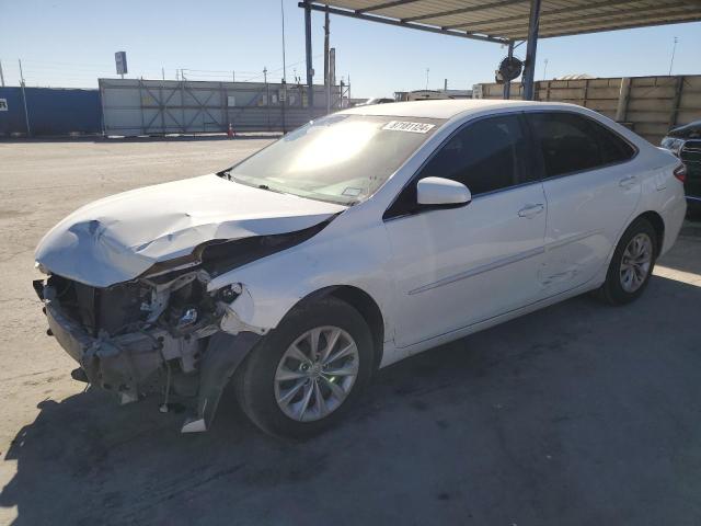 TOYOTA CAMRY LE 2017 with VIN 4T1BF1FK7HU709708 - Photo from auction