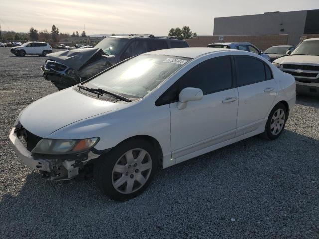 HONDA CIVIC LX 2011 with VIN 2HGFA1F55BH308460 - Photo from auction