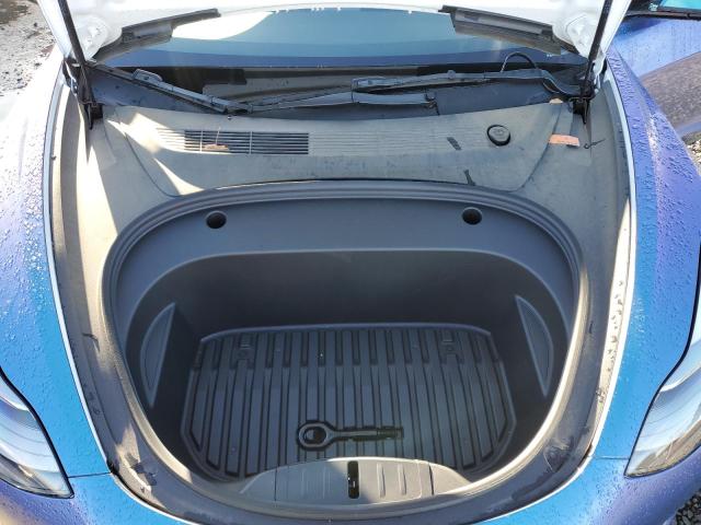 Photo 11 from auction – 2022 TESLA MODEL 3 with VIN 5YJ3E1EB2NF221977