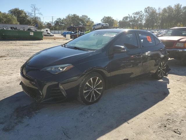 TOYOTA COROLLA L 2018 with VIN 5YFBURHE5JP762698 - Photo from auction
