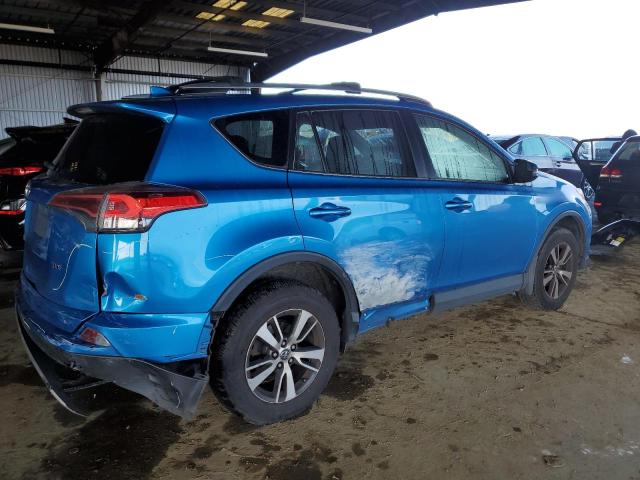 Photo 3 from auction – 2017 TOYOTA RAV4 XLE with VIN JTMWFREV4HD093837