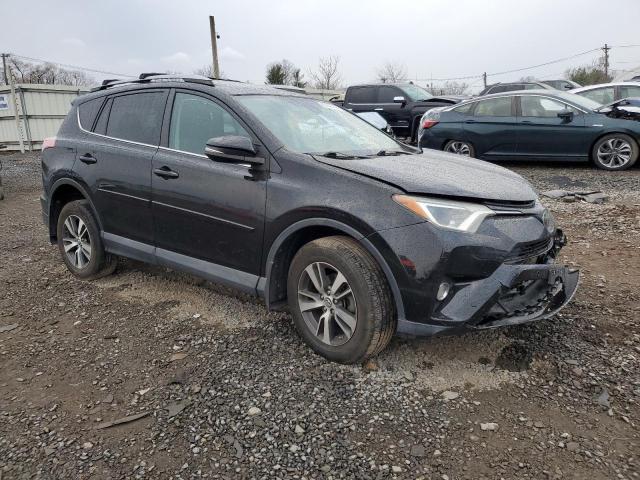 Photo 4 from auction – 2017 TOYOTA RAV4 XLE with VIN 2T3RFREV8HW596397