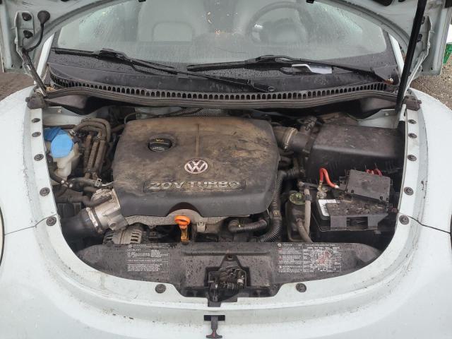 Photo 11 from auction – 2004 VOLKSWAGEN NEW BEETLE with VIN 3VWCD31Y44M347368