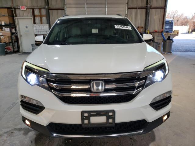 Photo 5 from auction – 2016 HONDA PILOT TOUR with VIN 5FNYF6H94GB071706