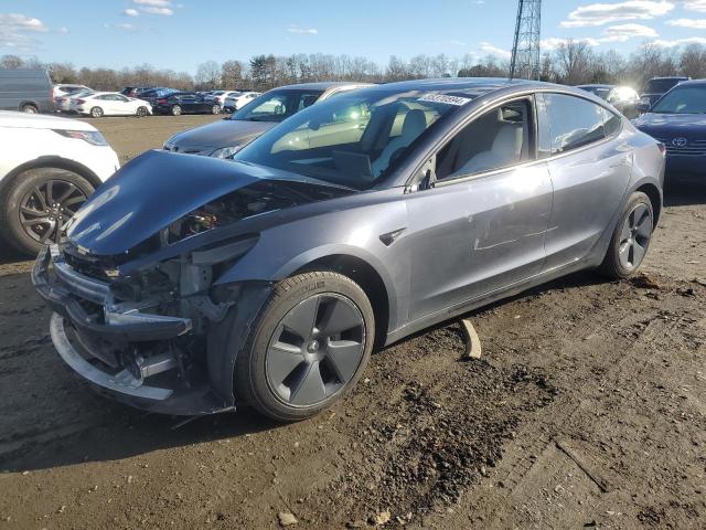TESLA MODEL 3 2022 with VIN 5YJ3E1EB2NF261637 - Photo from auction