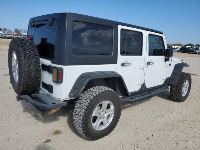 Photo 3 from auction – 2014 JEEP WRANGLER U with VIN 1C4BJWDG1EL307831
