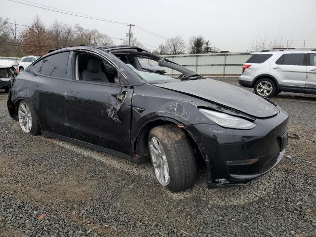 Photo 4 from auction – 2023 TESLA MODEL Y with VIN 7SAYGDEE8PA044544