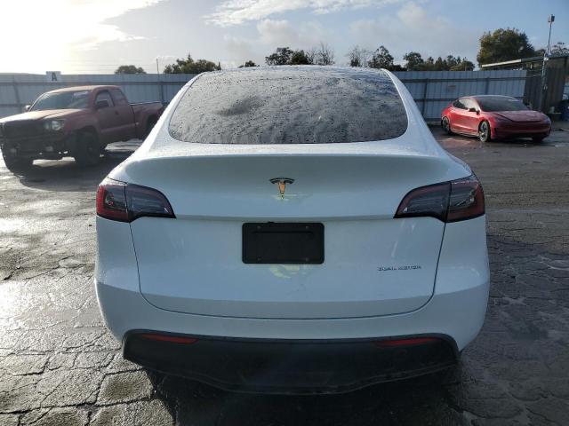 Photo 6 from auction – 2023 TESLA MODEL Y with VIN 7SAYGDEE4PF695575