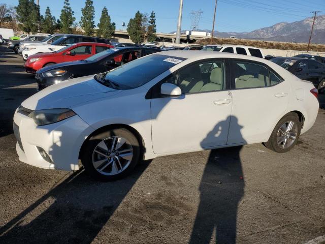 TOYOTA COROLLA EC 2014 with VIN 5YFBPRHE1EP004936 - Photo from auction