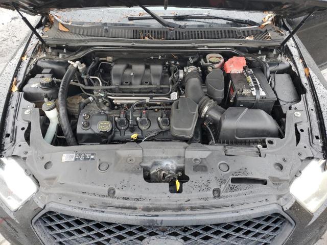 Photo 11 from auction – 2015 FORD TAURUS POL with VIN 1FAHP2MK6FG142641