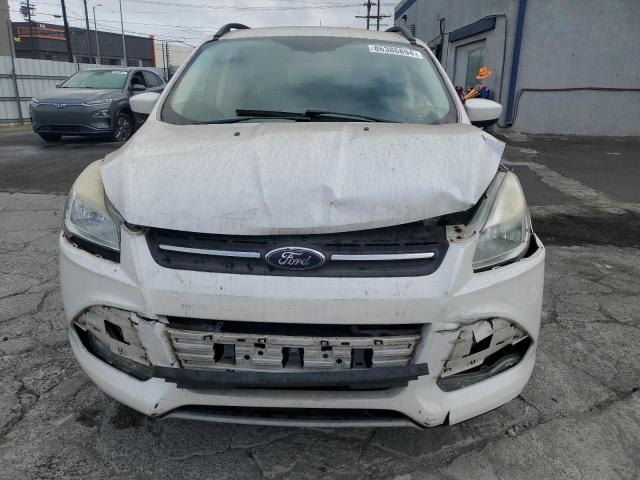 Photo 5 from auction – 2016 FORD ESCAPE SE with VIN 1FMCU0GX4GUA99182