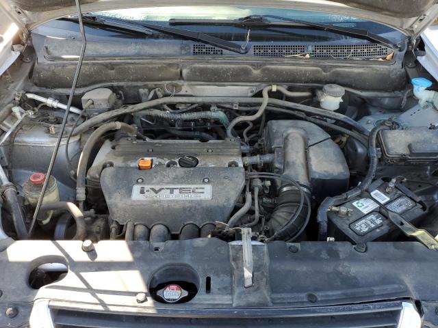 Photo 12 from auction – 2004 HONDA CR-V LX with VIN JHLRD68494C008787
