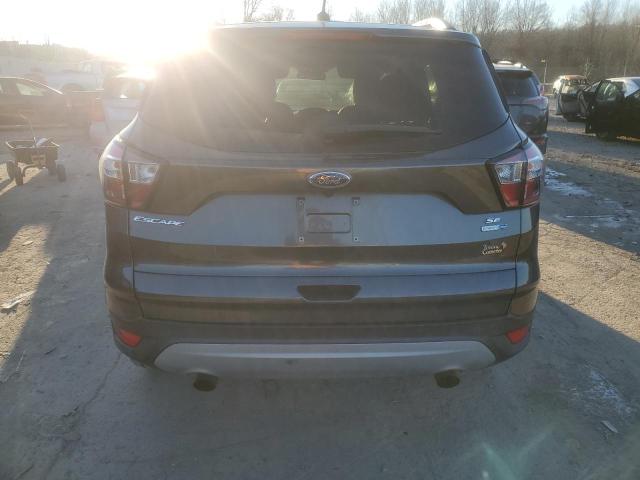 Photo 6 from auction – 2018 FORD ESCAPE SE with VIN 1FMCU9GD6JUD07418