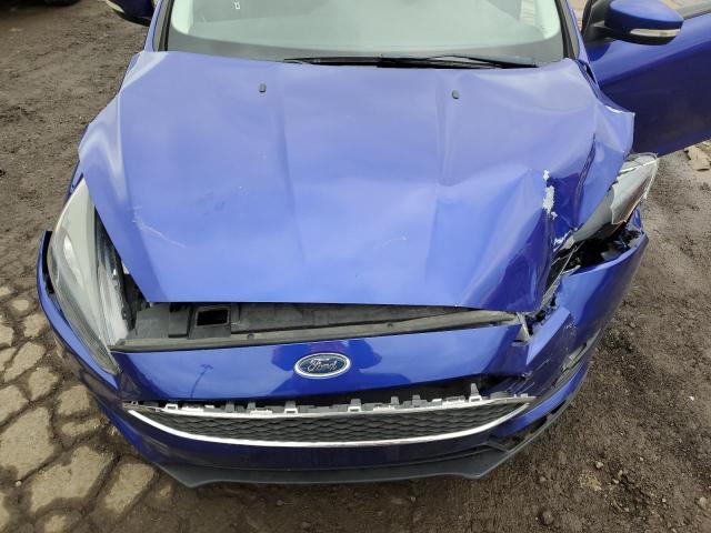 Photo 11 from auction – 2015 FORD FOCUS SE with VIN 1FADP3F26FL323182
