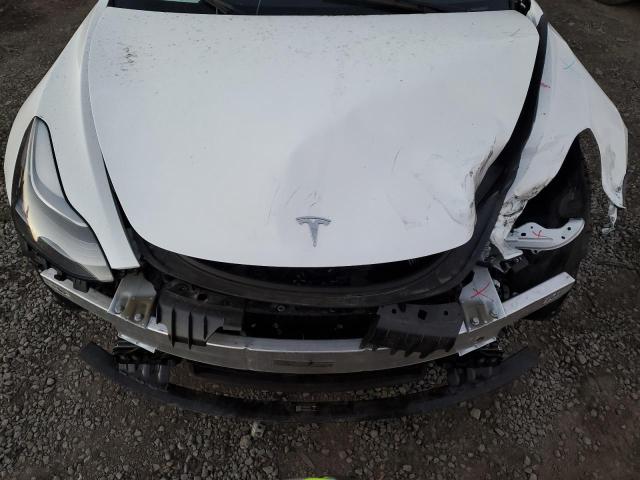 Снимка 11 от търг – 2023 TESLA MODEL 3 с VIN 5YJ3E1EA5PF610249