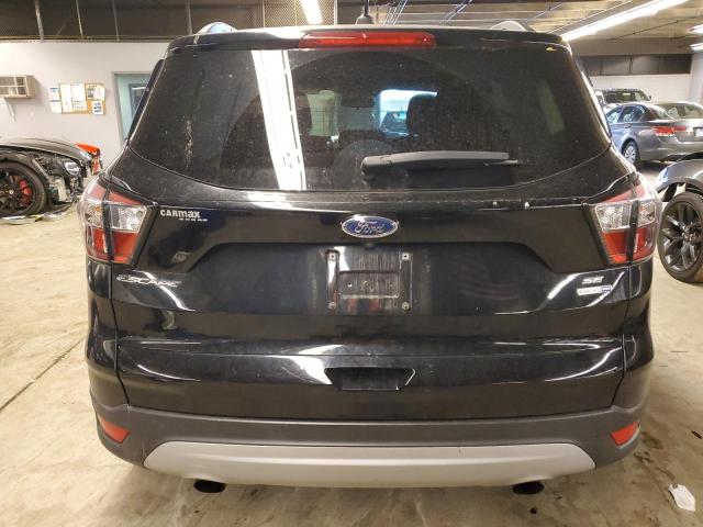 Photo 6 from auction – 2018 FORD ESCAPE SE with VIN 1FMCU9GD8JUA49967