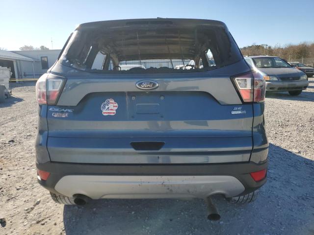 Photo 6 from auction – 2018 FORD ESCAPE SE with VIN 1FMCU9GD7JUA29659