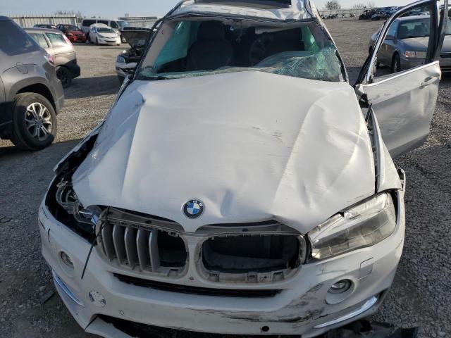 Photo 12 from auction – 2014 BMW X5 XDRIVE5 with VIN 5UXKR6C52E0J72349
