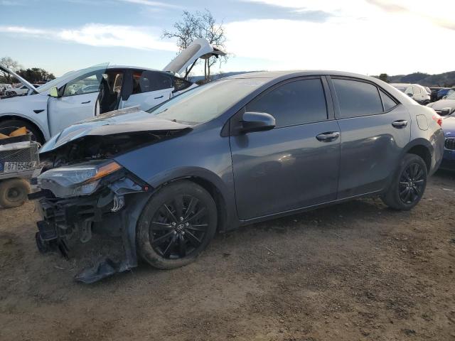 TOYOTA COROLLA L 2018 with VIN 5YFBURHE7JP816986 - Photo from auction